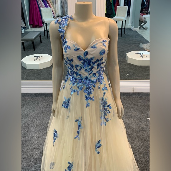 Size 10. ballgown color nude and french blue. strapless one shoulder. tulle